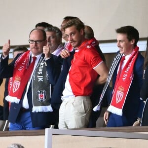 Semi-exclusif - Le prince Albert II de Monaco avec ses neveux Pierre Casiraghi et Louis Ducruet, tous trois portant la moustache en hommage à la compagnie des Carabiniers du Prince qui fête son bicentenaire, lors du match de Ligue des Champions entre l'AS Monaco et le Besiktas Istanbul au stade Louis II à Monaco le 17 octobre 2017. © Bruno Bebert / Bestimage