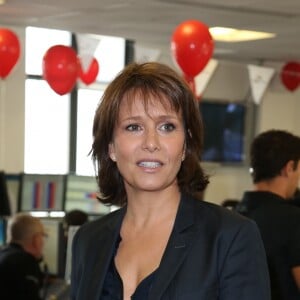 Charity Day BGC 2014 - Carole Rousseau - Courtier d'un jour pour encourager les clients à passer ce jour là le maximum d'ordres dans la salle des marchés d'Aurel BGC Rue Vivienne à Paris. Le 11 septembre 2014.