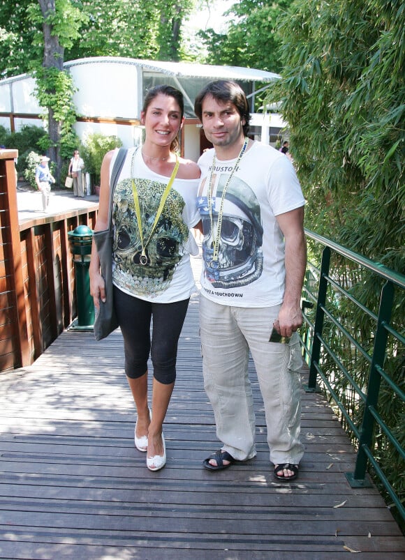 Chistophe Dominici et sa femme Loretta à Roland Garros à Paris. Le 24 mai 2010