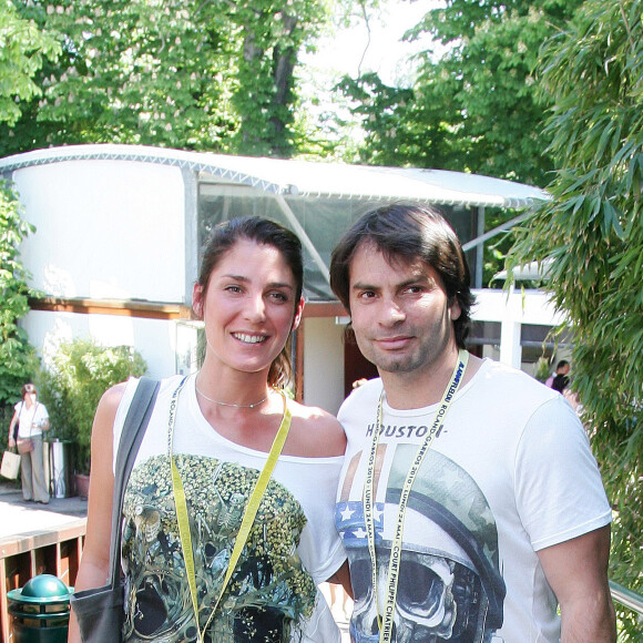 Chistophe Dominici et sa femme Loretta à Roland Garros à Paris. Le 24 mai 2010