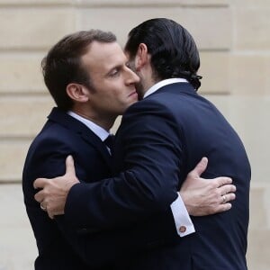 Emmanuel Macron, président de la République Française, et sa femme la première Dame Brigitte Macron reçoivent l'ex-Premier ministre libanais Saad Hariri accompagné de sa femme Lara et de son fils Hussam au palais de l'Elysée. Paris, le 18 novembre 2017. © Stéphane Lemouton/Bestimage