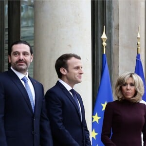 Emmanuel Macron, président de la République Française, et sa femme la première Dame Brigitte Macron reçoivent l'ex-Premier ministre libanais Saad Hariri accompagné de sa femme Lara et de son fils Hussam au palais de l'Elysée. Paris, le 18 novembre 2017. © Stéphane Lemouton/Bestimage