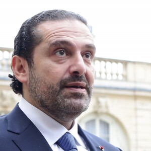 Emmanuel Macron, président de la République Française, et sa femme la première dame Brigitte Macron (Trogneux) raccompagnent l'ex-Premier ministre libanais Saad Hariri accompagné de sa femme Lara et de son fils Hussam, après leur entretien et leur déjeuner dans le "Salon des Portraits" au Palais de l'Elysée. Paris, le 18 novembre 2017. © Stéphane Lemouton/Bestimage