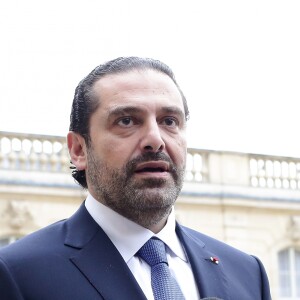 Emmanuel Macron, président de la République Française, et sa femme la première dame Brigitte Macron (Trogneux) raccompagnent l'ex-Premier ministre libanais Saad Hariri accompagné de sa femme Lara et de son fils Hussam, après leur entretien et leur déjeuner dans le "Salon des Portraits" au Palais de l'Elysée. Paris, le 18 novembre 2017. © Stéphane Lemouton/Bestimage