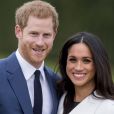 Le prince Harry et Meghan Markle lors de la séance photo le jour de l'annonce de leurs fiançailles, le 27 novembre 2017, dans les jardins du palais de Kensington, à Londres.
