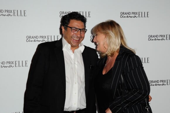 Charlotte de Turckheim et son mari Zaman Hachemi lors de la soirée du Grand Prix Cinéma Elle au Gaumont Marignan à Paris le 8 octobre 2013