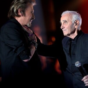 Johnny Hallyday et Charles Aznavour Paris le 11 janvier 2013 En direct du Zenith, La Fete de la Chanson Francaise, emission de divertissement presentee par Daniela Lumbroso11/01/2013 - 