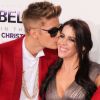 Justin Bieber et sa mère Pattie Mallette à la première du film "Justin Bieber's Believe" au Regal Cinemas L.A. Live à Los Angeles le 18 decembre 2013.