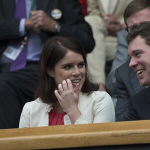 La princesse Eugenie d'York et son compagnon Jack Brooksbank à Wimbledon en juillet 2014. La princesse Eugenie et Jack se sont fiancés en janvier 2018 au Nicaragua et leur mariage sera célébré à Windsor à l'automne 2018, a révélé Buckingham Palace le 22 janvier 2018.