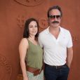 Jean Dujardin et sa compagne Nathalie Pechalat au village lors de la finale homme des internationaux de France de Roland Garros à Paris, le 11 juin 2017. © Dominique Jacovides - Cyril Moreau/ Bestimage