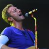 Chris Martin lors du concert de son groupe Coldplay au Stade de France à Saint-Denis, le 15 juillet 2017.