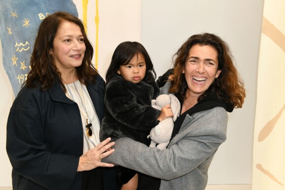 Christine Innamorato, directrice artistique de Bonpoint, Mademoiselle Agnès et sa fille Swan au défilé Bonpoint printempt-été 2018 à Paris, le 24 janvier 2018.