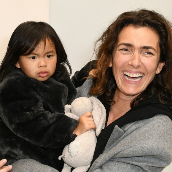 Christine Innamorato, directrice artistique de Bonpoint, Mademoiselle Agnès et sa fille Swan au défilé Bonpoint printempt-été 2018 à Paris, le 24 janvier 2018.