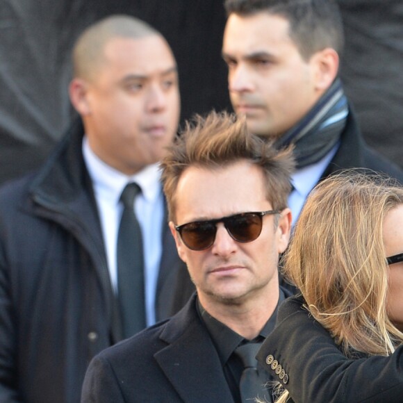 Laeticia Hallyday avec Laura Smet et David Hallyday sur le parvis de l'église de la Madeleine lors des obsèques de Johnny Hallyday à Paris le 9 décembre 2017. © Veeren / Bestimage