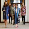 La duchesse de Cambridge, enceinte de près de huit mois, le 27 février 2018 lors de sa visite au Royal College of Obstetricians and Gynaecologists à Londres.
