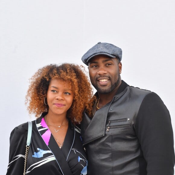 Luthna Plocus et son compagnon Teddy Riner au défilé de Léonard, collection prêt-à-porter automne-hiver 2018/2019, à Paris, le 5mars 2018 © CVS-Veeren / Bestimage