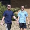 Exclusif - Sam Smith se promène main dans la main avec son compagnon Brandon Flynn à Los Angeles, le 6 mars 2018