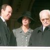 Le prince Albert, la princesse Caroline et le prince Rainier III de Monaco lors des célébrations de Sainte Dévoté en janvier 1988.