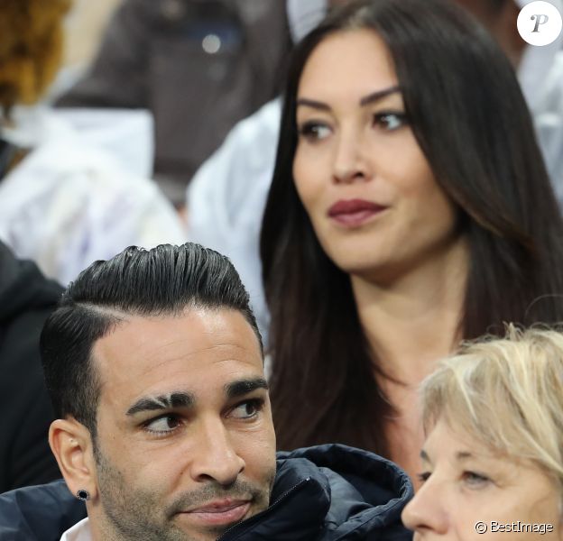Adil Rami et Sidonie Biémont enceinte lors du match du quart de finale de l'UEFA Euro 2016 France-Islande au Stade de France à Saint-Denis, le 3 juillet 2016. © Cyril Moreau/Bestimage