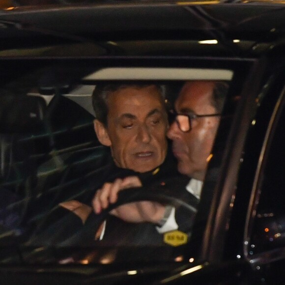 Nicolas Sarkozy et sa femme Carla Bruni-Sarkozy - Nicolas Sarkozy s'est rendu sur le plateau de TF1 lors du journal télévisé de 20 heures après sa mise en examen puis a été dîner avec sa femme Carla et son équipe dans le restaurant italien de la rue de la Pompe "Giulio Rebellato" à Paris le 22 mars 2018.