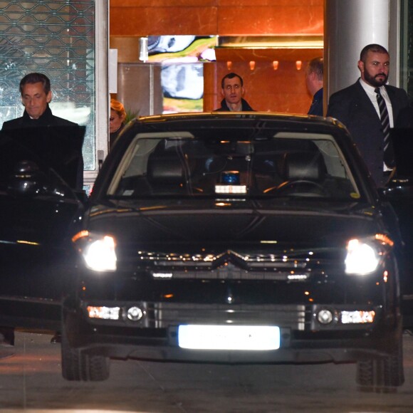 Nicolas Sarkozy et sa femme Carla Bruni-Sarkozy - Nicolas Sarkozy s'est rendu sur le plateau de TF1 lors du journal télévisé de 20 heures après sa mise en examen puis a été dîner avec sa femme Carla et son équipe dans le restaurant italien de la rue de la Pompe "Giulio Rebellato" à Paris le 22 mars 2018.