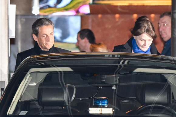 Nicolas Sarkozy et sa femme Carla Bruni-Sarkozy - Nicolas Sarkozy s'est rendu sur le plateau de TF1 lors du journal télévisé de 20 heures après sa mise en examen puis a été dîner avec sa femme Carla et son équipe dans le restaurant italien de la rue de la Pompe "Giulio Rebellato" à Paris le 22 mars 2018.