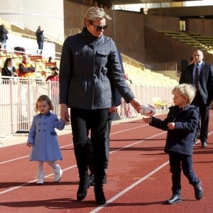 Le prince Albert II de Monaco, la princesse Charlene de Monaco et leurs enfants, le prince Jacques et la princesse Gabriella - 8ème édition du tournoi de rugby Sainte-Dévote au Stade Louis II à Monaco, le 31 mars 2018. © Jean-François Ottonello/Nice Matin/Bestimage