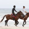 Exclusif - Noémie Lenoir et Iris Mittenaere font une balade à cheval sur la plage dans le cadre de leur séjour à Abidjan à l'occasion du 20ème anniversaire de la fondation "Children of Africa", le 17 mars 2018. © Dominique Jacovides/Bestimage