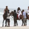 Exclusif -  Noémie Lenoir et Iris Mittenaere font une balade à cheval sur la plage dans le cadre de leur séjour à Abidjan à l'occasion du 20ème anniversaire de la fondation "Children of Africa", le 17 mars 2018. © Dominique Jacovides/Bestimage
