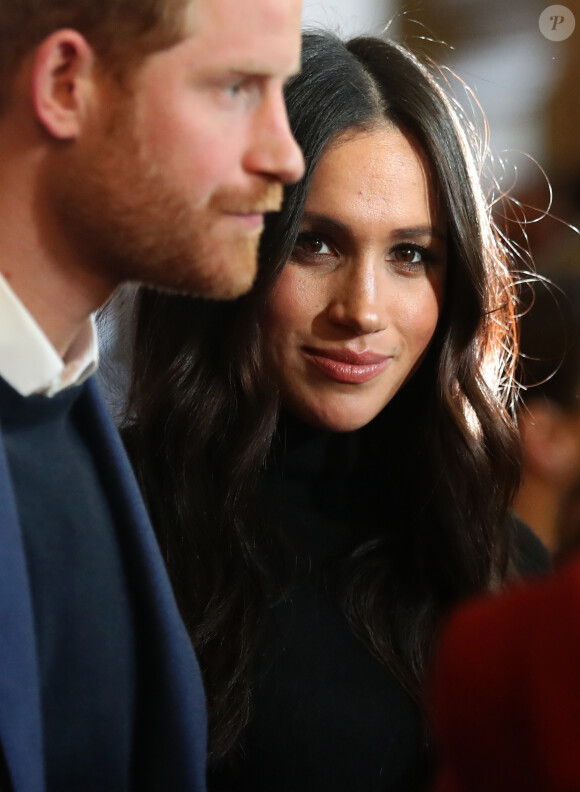 Le prince Harry et Meghan Markle lors d'une réception pour les jeunes au palais de Holyroodhouse à Edimbourg, Ecosse, le 13 février 2018.