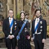 Le prince Daniel avec la princesse Sofia et le prince Carl Philip de Suède le 17 janvier 2018 à Stockholm, au palais royal lors d'un dîner d'Etat.