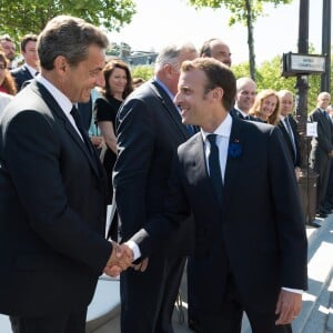 Nicolas Sarkozy et le président de la république Emmanuel Macron - Le président de la république Emmanuel Macron à l'Arc de Triomphe à l'occasion des cérémonies du 8-Mai marquant le 73e anniversaire de la victoire alliée sur l'Allemagne nazie en 1945. Jacques Witt / Laurent Chamussy / Pool / Bestimage