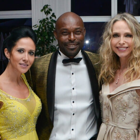 Exclusif - Fabienne Carat (en robe Christophe Guillarmé), Jimmy Jean-Louis, Tonya Kinzinger au dîner caritatif "The Global Gift Initiative" au Carlton Beach Club lors du 71ème Festival International du Film de Cannes, le 11 mai 2018. © CVS/Bestimage