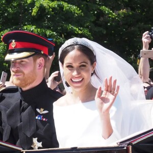 Le prince Harry et Meghan Markle, duc et duchesse de Sussex, ont effectué une procession dans le landau Ascot après leur mariage en la chapelle St George à Windsor le 19 mai 2018, à la rencontre du public dans toute la ville de Windsor et le long du Long Walk.