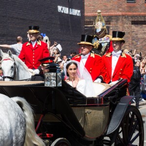 Le prince Harry et Meghan Markle, duc et duchesse de Sussex, ont effectué une procession dans le landau Ascot après leur mariage en la chapelle St George à Windsor le 19 mai 2018, à la rencontre du public dans toute la ville de Windsor et le long du Long Walk.