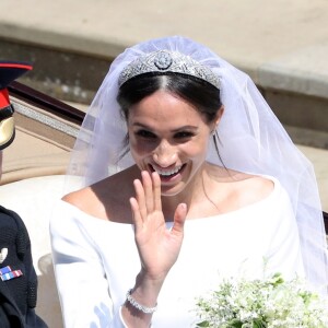 Le prince Harry et Meghan Markle, duc et duchesse de Sussex, ont effectué une procession dans le landau Ascot après leur mariage en la chapelle St George à Windsor le 19 mai 2018, à la rencontre du public dans toute la ville de Windsor et le long du Long Walk.