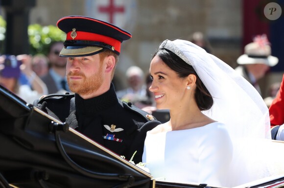 Le prince Harry et Meghan Markle, duc et duchesse de Sussex, ont effectué une procession dans le landau Ascot après leur mariage en la chapelle St George à Windsor le 19 mai 2018, à la rencontre du public dans toute la ville de Windsor et le long du Long Walk.