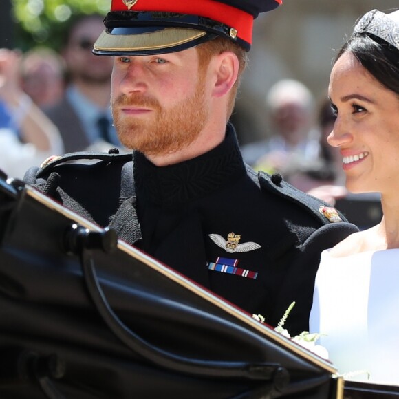 Le prince Harry et Meghan Markle, duc et duchesse de Sussex, ont effectué une procession dans le landau Ascot après leur mariage en la chapelle St George à Windsor le 19 mai 2018, à la rencontre du public dans toute la ville de Windsor et le long du Long Walk.