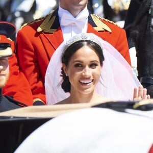 Le prince Harry et Meghan Markle, duc et duchesse de Sussex, ont effectué une procession dans le landau Ascot après leur mariage en la chapelle St George à Windsor le 19 mai 2018, à la rencontre du public dans toute la ville de Windsor et le long du Long Walk.