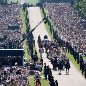 Le prince Harry et Meghan Markle, duc et duchesse de Sussex, ont effectué une procession dans le landau Ascot après leur mariage en la chapelle St George à Windsor le 19 mai 2018, à la rencontre du public dans toute la ville de Windsor et le long du Long Walk.