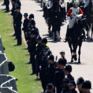 Le prince Harry et Meghan Markle, duc et duchesse de Sussex, ont effectué une procession dans le landau Ascot après leur mariage en la chapelle St George à Windsor le 19 mai 2018, à la rencontre du public dans toute la ville de Windsor et le long du Long Walk.