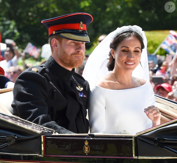 Le prince Harry et Meghan Markle, duc et duchesse de Sussex, ont effectué une procession dans le landau Ascot après leur mariage en la chapelle St George à Windsor le 19 mai 2018, à la rencontre du public dans toute la ville de Windsor et le long du Long Walk.