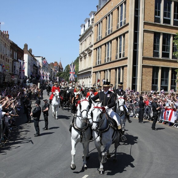 Le prince Harry et Meghan Markle, duc et duchesse de Sussex, ont effectué une procession dans le landau Ascot après leur mariage en la chapelle St George à Windsor le 19 mai 2018, à la rencontre du public dans toute la ville de Windsor et le long du Long Walk.