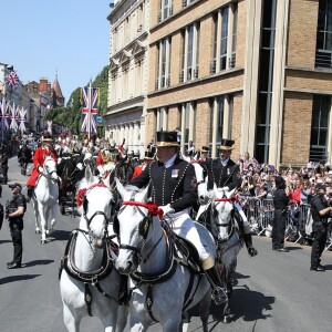 Le prince Harry et Meghan Markle, duc et duchesse de Sussex, ont effectué une procession dans le landau Ascot après leur mariage en la chapelle St George à Windsor le 19 mai 2018, à la rencontre du public dans toute la ville de Windsor et le long du Long Walk.