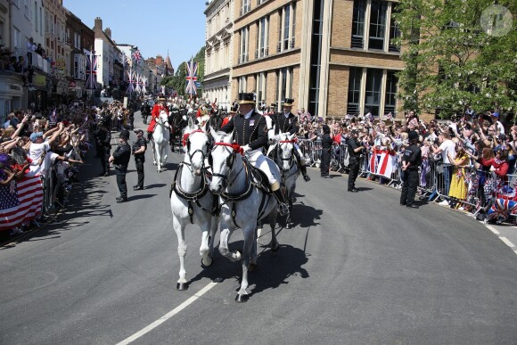 Le prince Harry et Meghan Markle, duc et duchesse de Sussex, ont effectué une procession dans le landau Ascot après leur mariage en la chapelle St George à Windsor le 19 mai 2018, à la rencontre du public dans toute la ville de Windsor et le long du Long Walk.