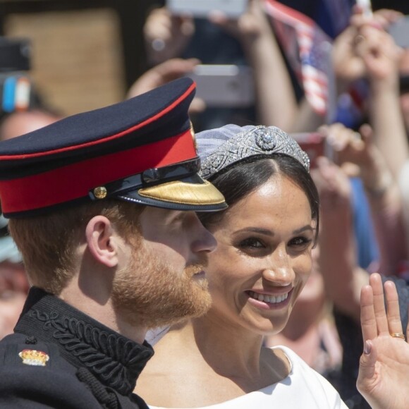 Le prince Harry et Meghan Markle, duc et duchesse de Sussex, ont effectué une procession dans le landau Ascot après leur mariage en la chapelle St George à Windsor le 19 mai 2018, à la rencontre du public dans toute la ville de Windsor et le long du Long Walk.