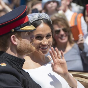 Le prince Harry et Meghan Markle, duc et duchesse de Sussex, ont effectué une procession dans le landau Ascot après leur mariage en la chapelle St George à Windsor le 19 mai 2018, à la rencontre du public dans toute la ville de Windsor et le long du Long Walk.