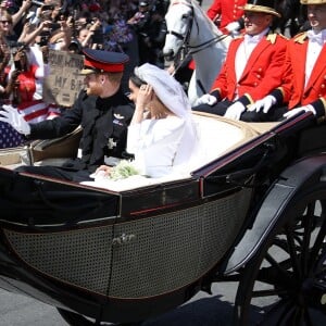 Le prince Harry et Meghan Markle, duc et duchesse de Sussex, ont effectué une procession dans le landau Ascot après leur mariage en la chapelle St George à Windsor le 19 mai 2018, à la rencontre du public dans toute la ville de Windsor et le long du Long Walk.