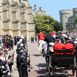 Meghan Markle et le prince Harry, duc et duchesse de Sussex, ont effectué une procession dans le landau Ascot après leur mariage en la chapelle St George à Windsor le 19 mai 2018, à la rencontre du public dans toute la ville de Windsor et le long du Long Walk.