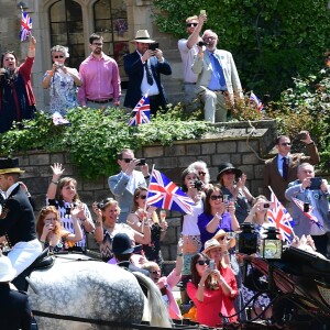 Le prince Harry et Meghan Markle, duc et duchesse de Sussex, ont fait une procession dans le landau Ascot après leur mariage en la chapelle St George à Windsor le 19 mai 2018, à la rencontre du public dans toute la ville de Windsor et le long du Long Walk.